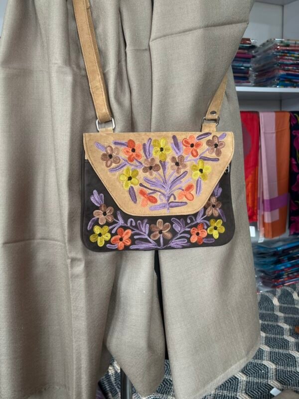 Beige–Black Dual Panel Sling Bag with Multi-Color Embroidery