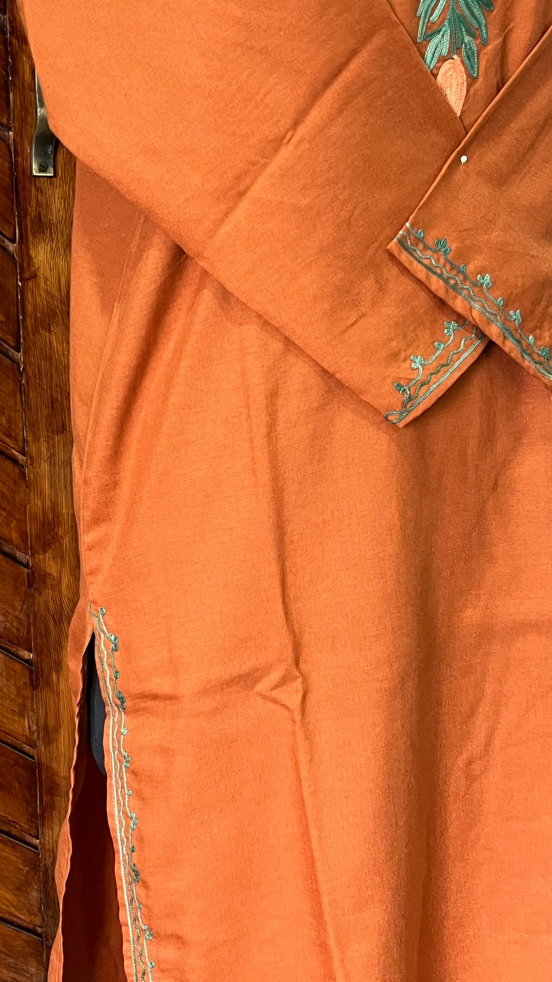 Rust Cotton Kurta with Green Aari embroidery Detail 1